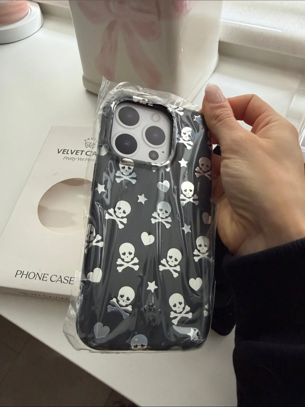 Velvet Caviar iPhone 15 pro Case with White Skulls & Hearts
